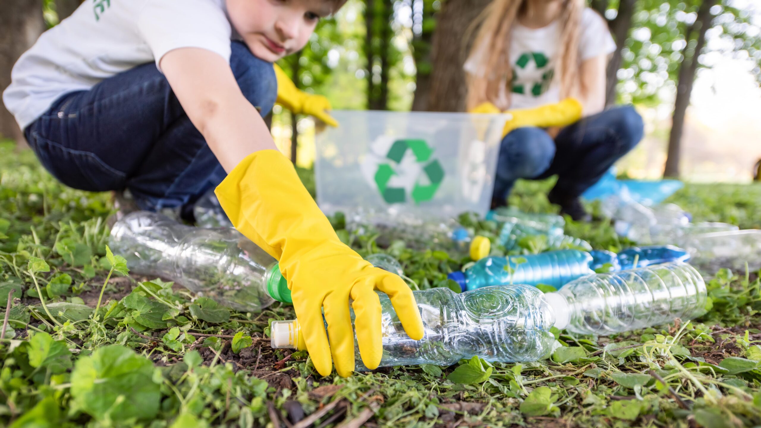 boy-girl-plastic-garbage-collection-park-min