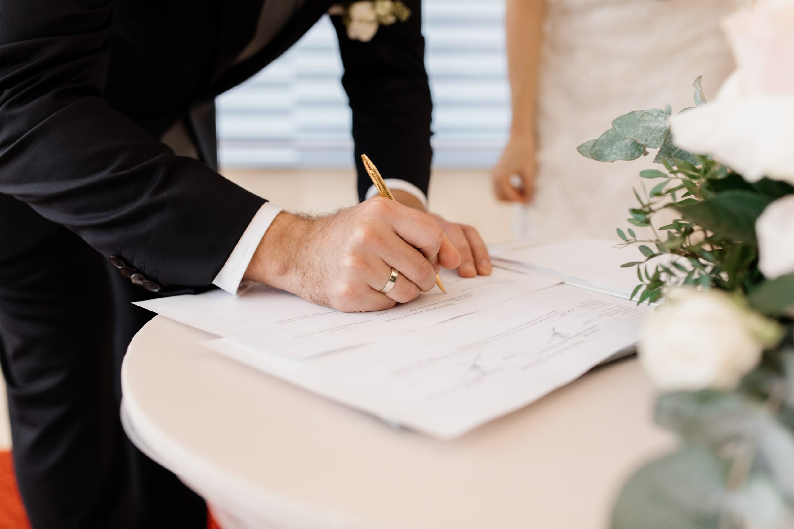 couple-love-is-signing-official-marriage-documents4-min